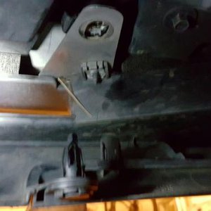 Taking off the air dam. Screws were mostly threaded in from above, making it a PITA to get to.