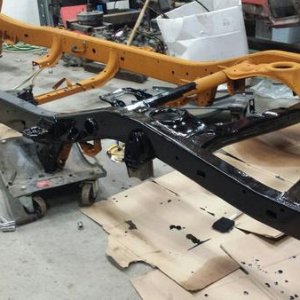Frame prepped and halfway done with POR 15