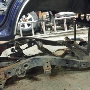 Old frame is pretty crusty. Previous owner welded in sheet metal and spray canned it black to cover up all the rot. Body however is in excellent shape