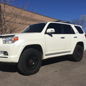New Burtman Industries 1" rear spacer installed. Just the right amount of lift for a more aggressive look without overdoing it. Along with a 1.5" fron