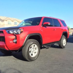 REMOVED PLASTI-DIPPED FENDERS AND USED VINYL WRAP FOR A MORE SEMI-PERMANENT LOOK.  2 INCH LIFT IN FRONT AND 1 INCH LIFT IN REAR
