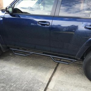 Took off the ugly aluminum stock boards and installed some nfabs, looks much better now.