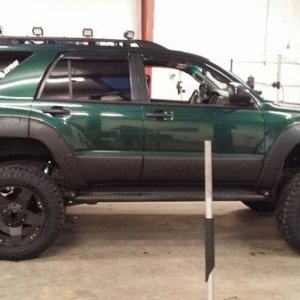 Getting her new shoes on.