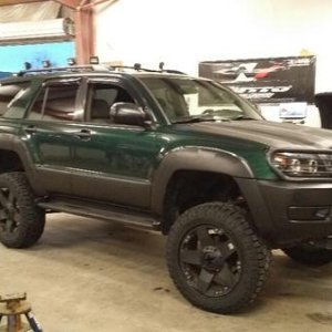 Getting her new shoes on.