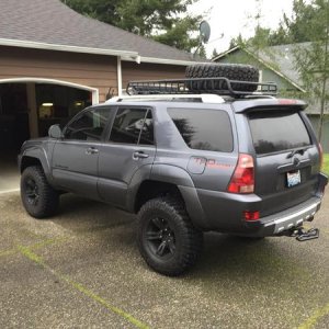 285/70/17 spare tire with stock spare rim on there until I get a new set of wheels so I can get 5 to match, plus the step on the hitch to move it when