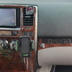 Kenwood 9702s with hdmi.mhl on dash, 4runner badge painted and moved to glove box. Newport burl wood interior.