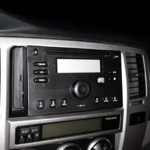 Camoflage!! 

$5 Fake Radio Trim Piece from Ebay