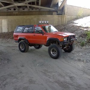 Posing under a bridge