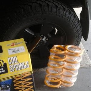 Adding tjm rear HD coils to suspension. Gained 2 inches of lift over stock coils and daystar rear spacer