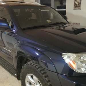 2005 Sport with 265/70/17 MTZs.  No lift.