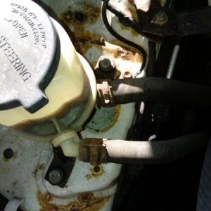 power steering fluid reservior hose clamp rusted