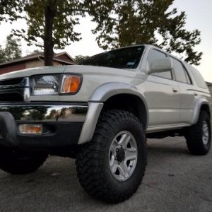 My Runner on 33" , 1.25 Spider T hub centric spacer with 3" Revtek lift.