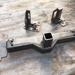 raw metal.  Great craftsmanship and quality wells.  This thing is solid!