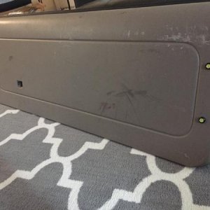 Rear hatch off with the bolts installed.  Two for the left side and two for the right side.