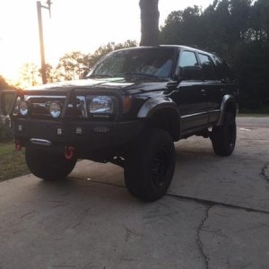 Finally put a 4" suspension lift on and a modified ARB Bumper.