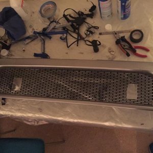 Made the appropriate cuts to fit the light bar mounts through the mesh.