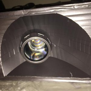 Fitting the projector to the housing.