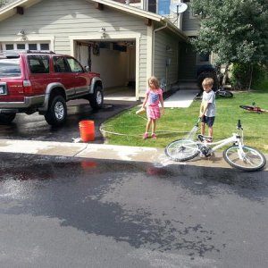 Teaching Ashley and Jack how to clean my truck!