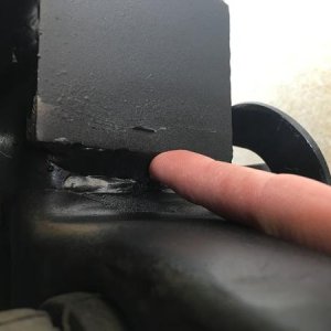 Bumper stitch welds to frame