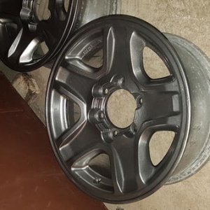 Spraying the new alloys with duplicolor rim paint and Hardening up in the furnace room. Next 295s