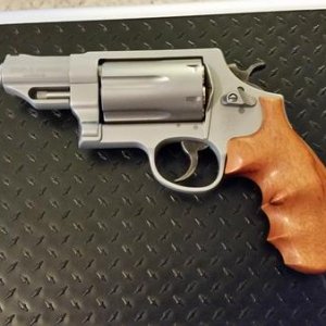 Upgraded my Smith and Wesson Governor with Hogue Custom wood grips.