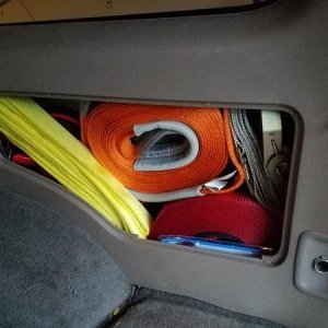 Modified cargo compartment! Fits my ARB Snatch strap, 65' winch extension, tree saver, jumper cables, and a 5000lb ratchet tie-down!