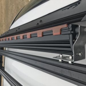 How I mounted the Black Oak bar to the Prinsu crossbar with a custom bracket I made.