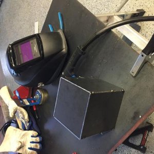 Center console lock box tack welded