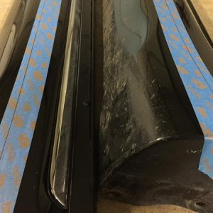 Here, I have removed the rocker panels from my 2012 SR5. I made a few marks 1.75" from the chrome strip and used a semi-flexible straightedge to draw 