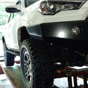 Getting new shoes. Thanks Gomm's tire in W. Milford. The big tire stores won't mount a tire bigger than stock.