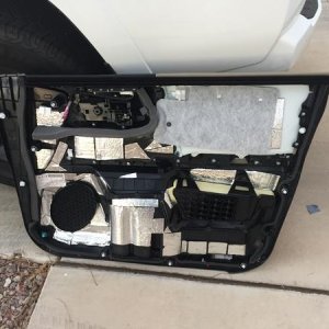 Lots of time was spent on the front doors. This picture shows how I sound deaden the inside of the panel with material from Home Depot.