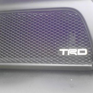 Statoshi grill with flush mounted mesh and TRD emblem