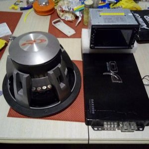 new android double din dvd gps unit option audio momo bloc 4000w 2000wrms amp 12inch alpine 1500w sub ready to install latter this week 25/7/17