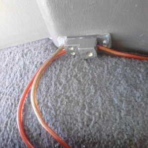 Splitter.....main power (fused of course) coming from battery, split here for constant 12v outlet and power for my Rockford sub and amp combo.