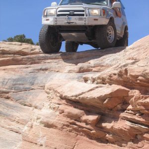 I think this was on Seven Mile Rim in Moab. Just a fun optional obstacle to go down and back up.