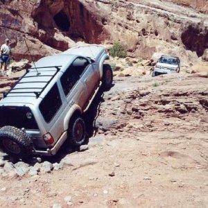 Winching up Pritchett Canyon's Rockpile obstacle. This is near Moab.