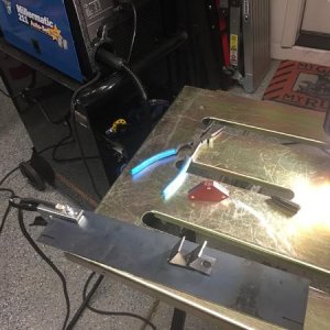 Pieces cut and mounting tabs tac welded