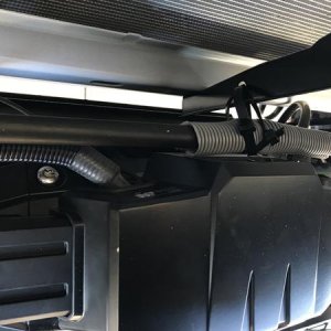 PS line brackets bent to get the line out of the way of the winch control box - no relocation needed