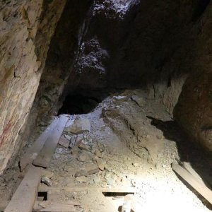 Cave in.