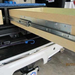 IMG 5325 accuride 3640 28" 200 lb glides. the drawers are removable. nice feature if something fall behind the drawer.