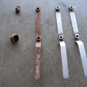 Curled bracket & new welded ones.