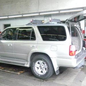 At Big O Tires waiting for my 2007 FJ 17 inch Wheels to be mounted on. Angled view.