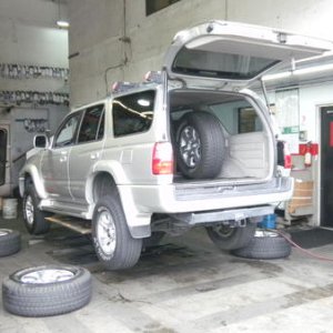 At Big O Tires waiting for my 2007 FJ 17 inch Wheels to be mounted on. You can see the new wheel on the floor. Nice!