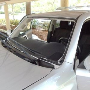 Cruising down the highway rock smashed the window. Luckily it was only this windshield and not paint/metal. This is her without her shield