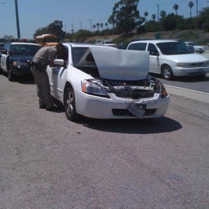 car that hit me...she was stuck under my rear bumper