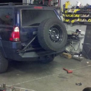 the license plate is now on a bracket with a plate light to keep me legal