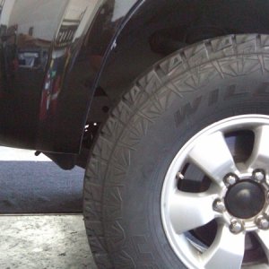 Wheel well fender clearance front left.