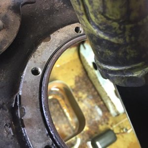 Flashlight looking into the tank showing the rust.