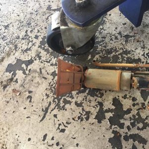 Rusty Fuel pump with torn sock..