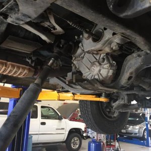 Tank removed at shop... Drive line hanging down.
